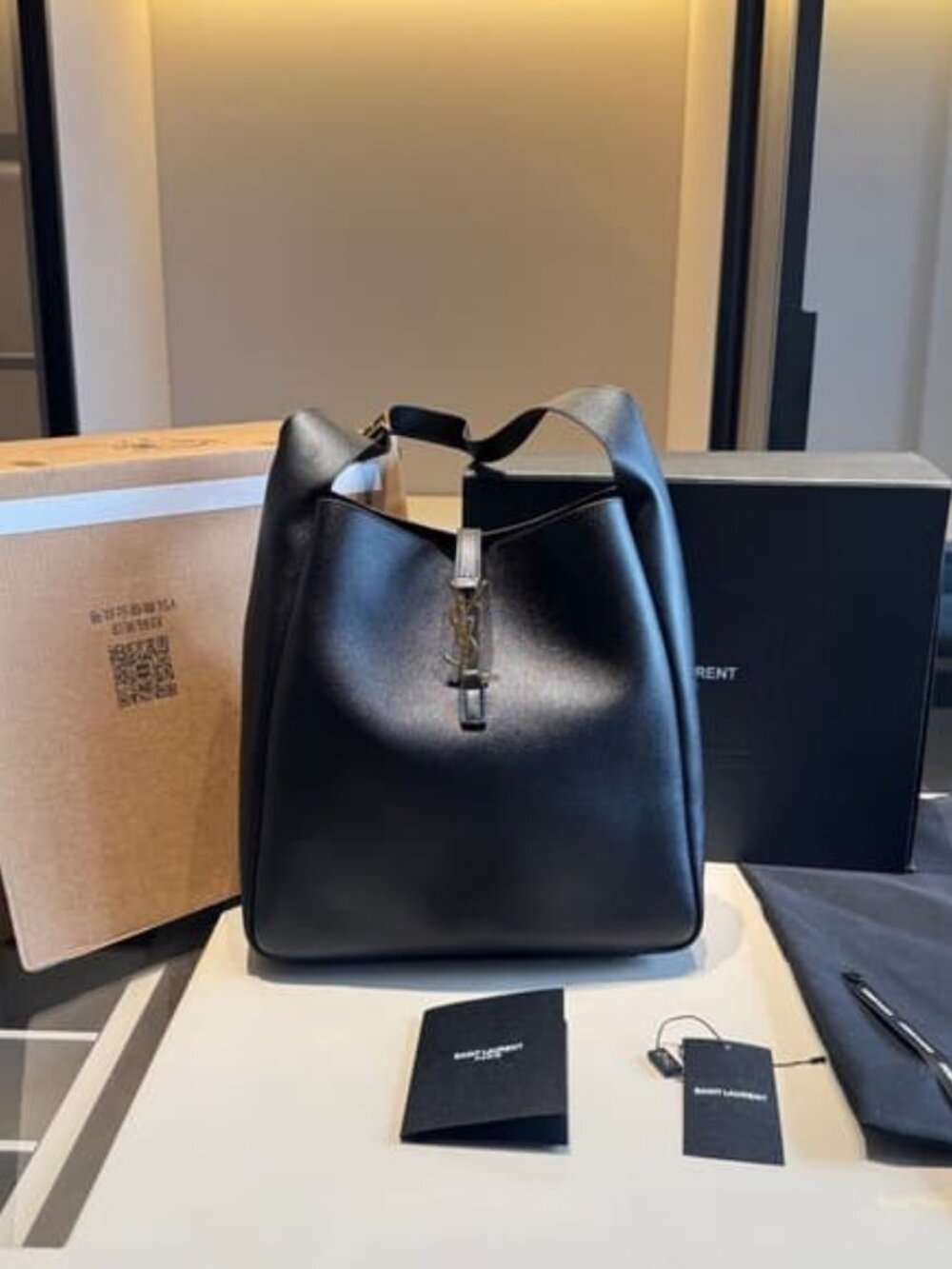 Saint Laurent Black Leather Bucket Bag with YSL Charm